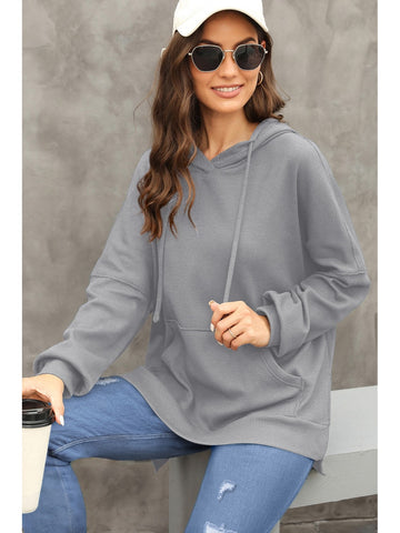 Back view of gray waffle-knit hoodie with relaxed fit – Voguelle