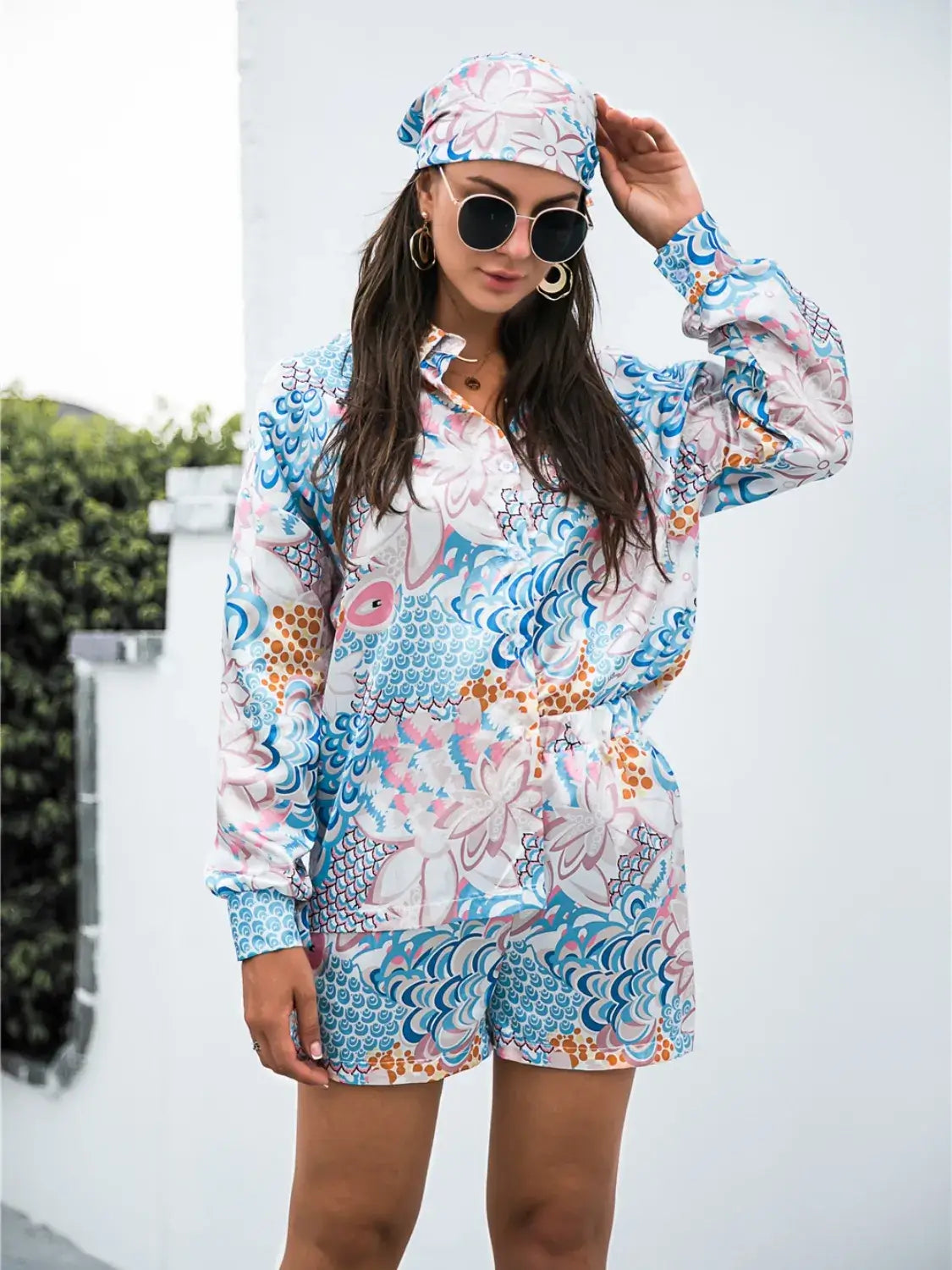 Model styling blue Printed Long Sleeve Shirt & Shorts Set outdoors – Voguelle