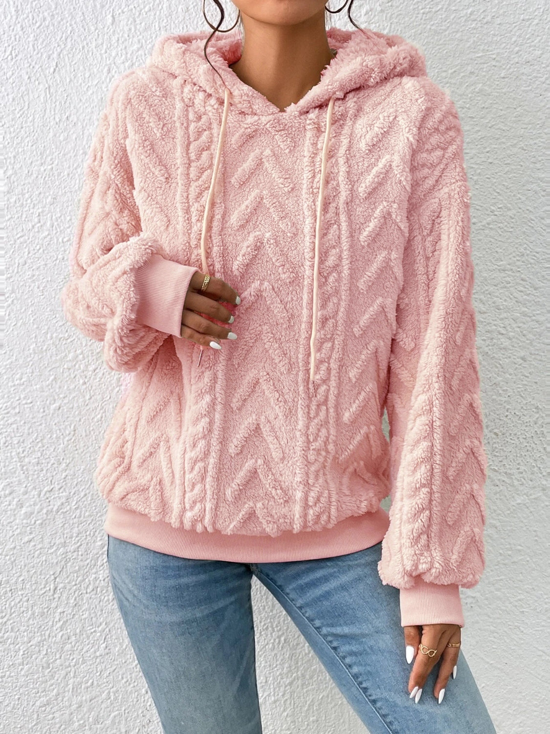 Front view of fleece textured drawstring hoodie in beige on model – Voguelle