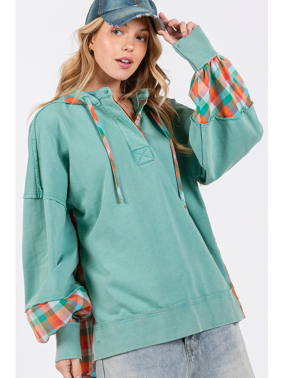 Front view of plaid contrast washed hoodie in green with drawstring – Voguelle