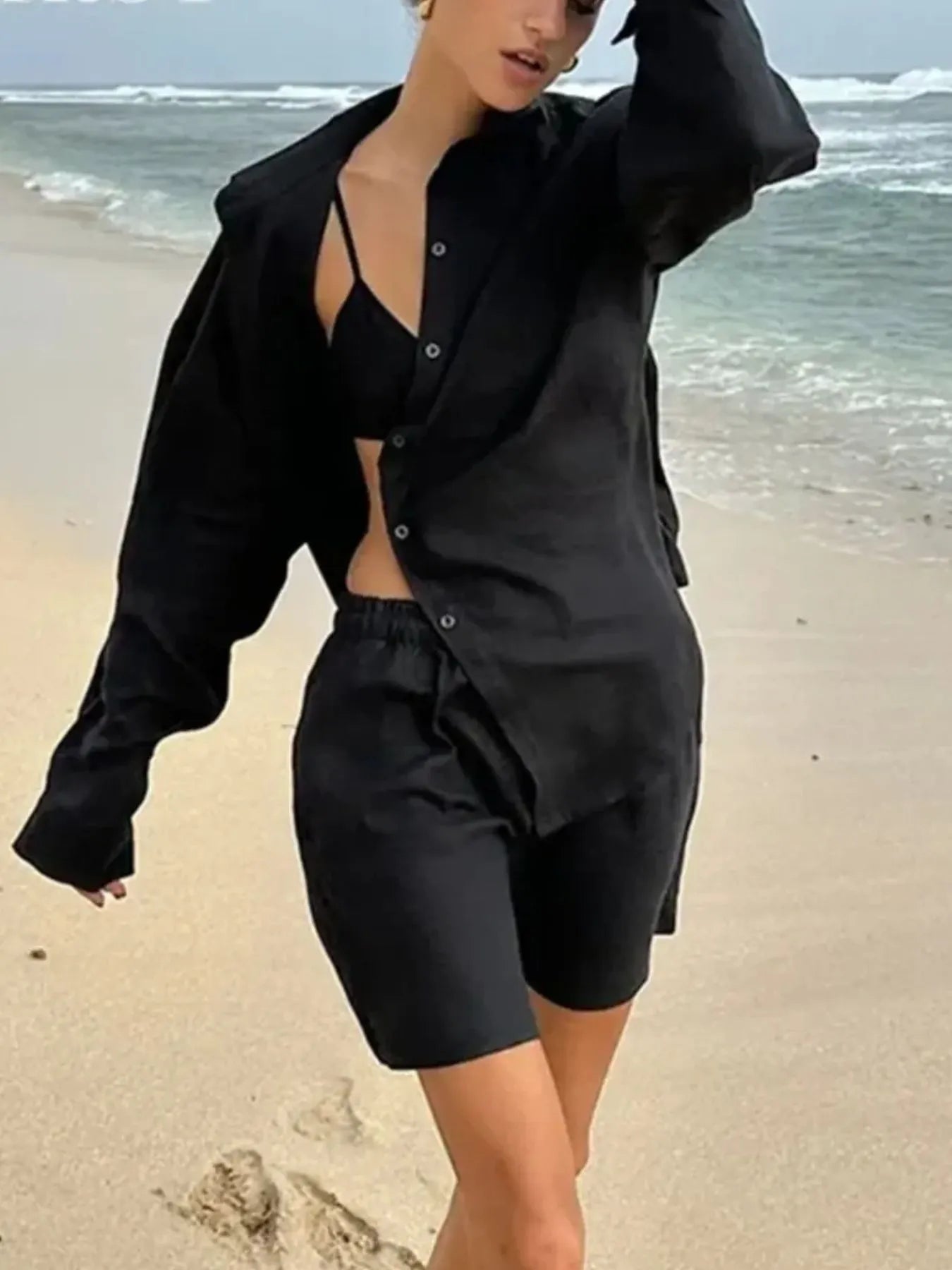 Relaxed oversized pink shirt styled with shorts – Voguelle