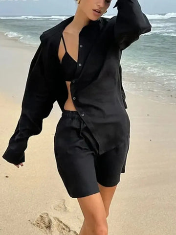 Relaxed oversized pink shirt styled with shorts – Voguelle