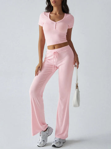 Side view of pink ribbed short sleeve crop top and pants loungewear – Voguelle