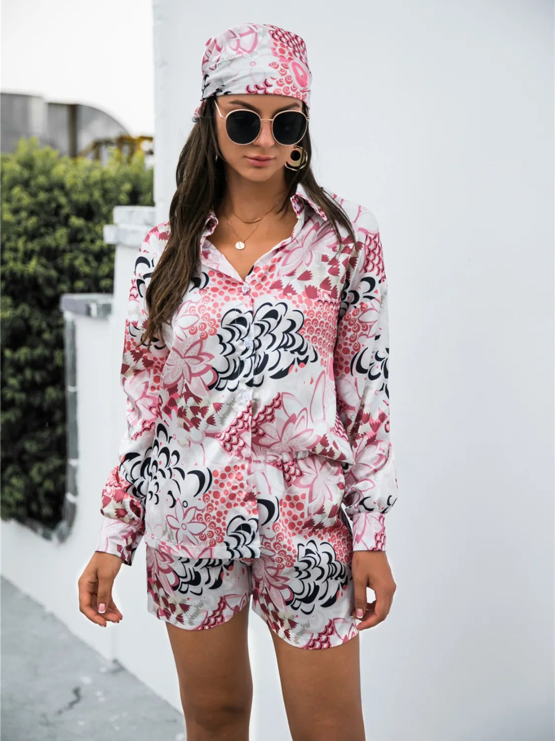Front view of Printed Button-Up Shirt & Shorts Set in pink on model – Voguelle
