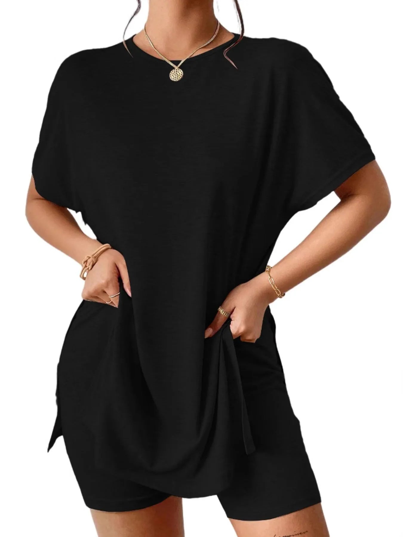 Side slit hem detail of pink tunic top – Voguelle