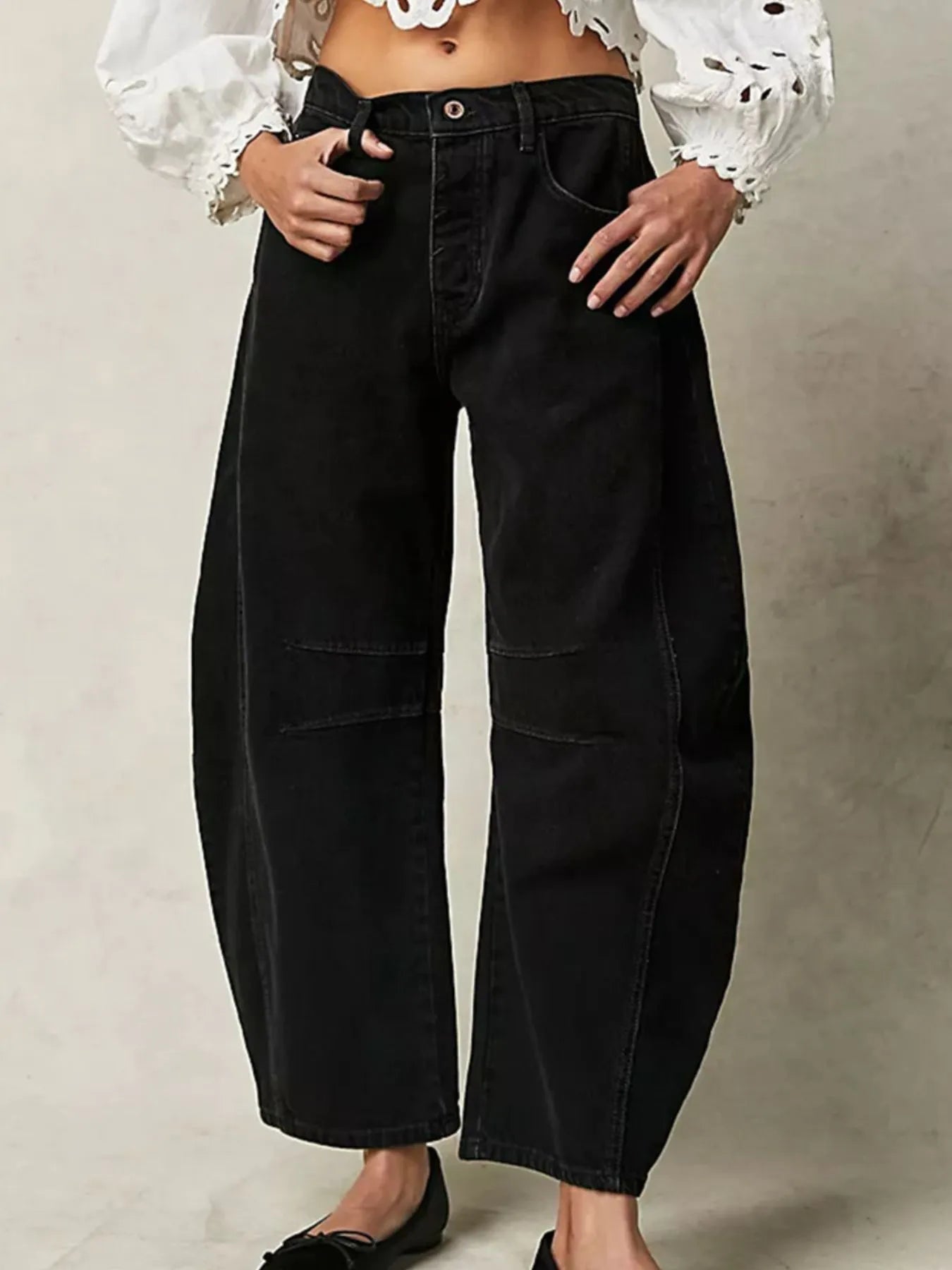 Front view of relaxed fit high-waisted wide leg jeans in black – Voguelle