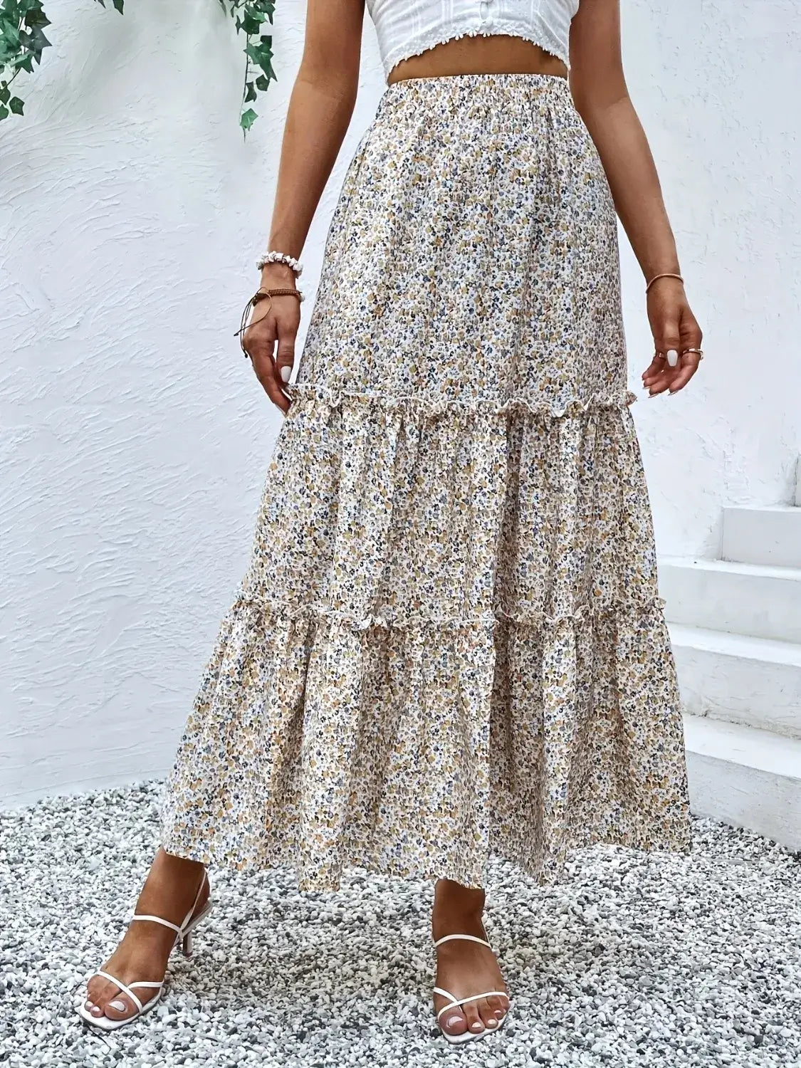 Front view of beige floral tier ruffle maxi skirt – Voguelle