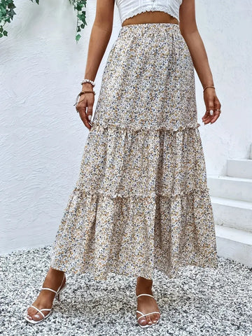 Front view of beige floral tier ruffle maxi skirt – Voguelle