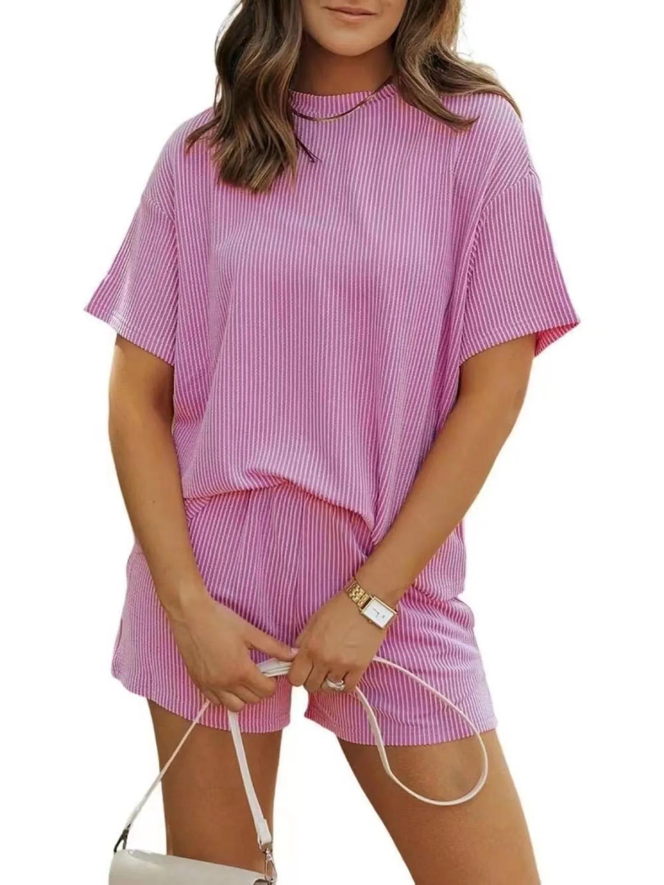 Model wearing Plus Size Ribbed Two-Piece Set with relaxed fit shorts – Voguelle