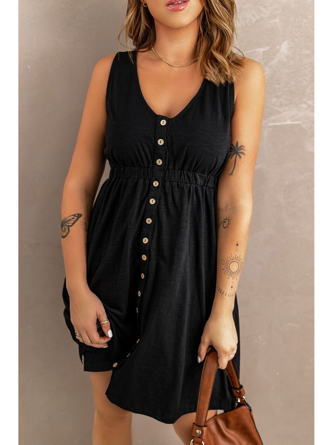 Side angle of sleeveless button down casual dress – Voguelle