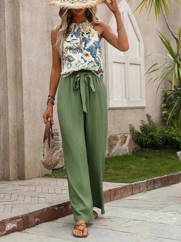 Side pose printed blouse with green wide leg trousers – Voguelle