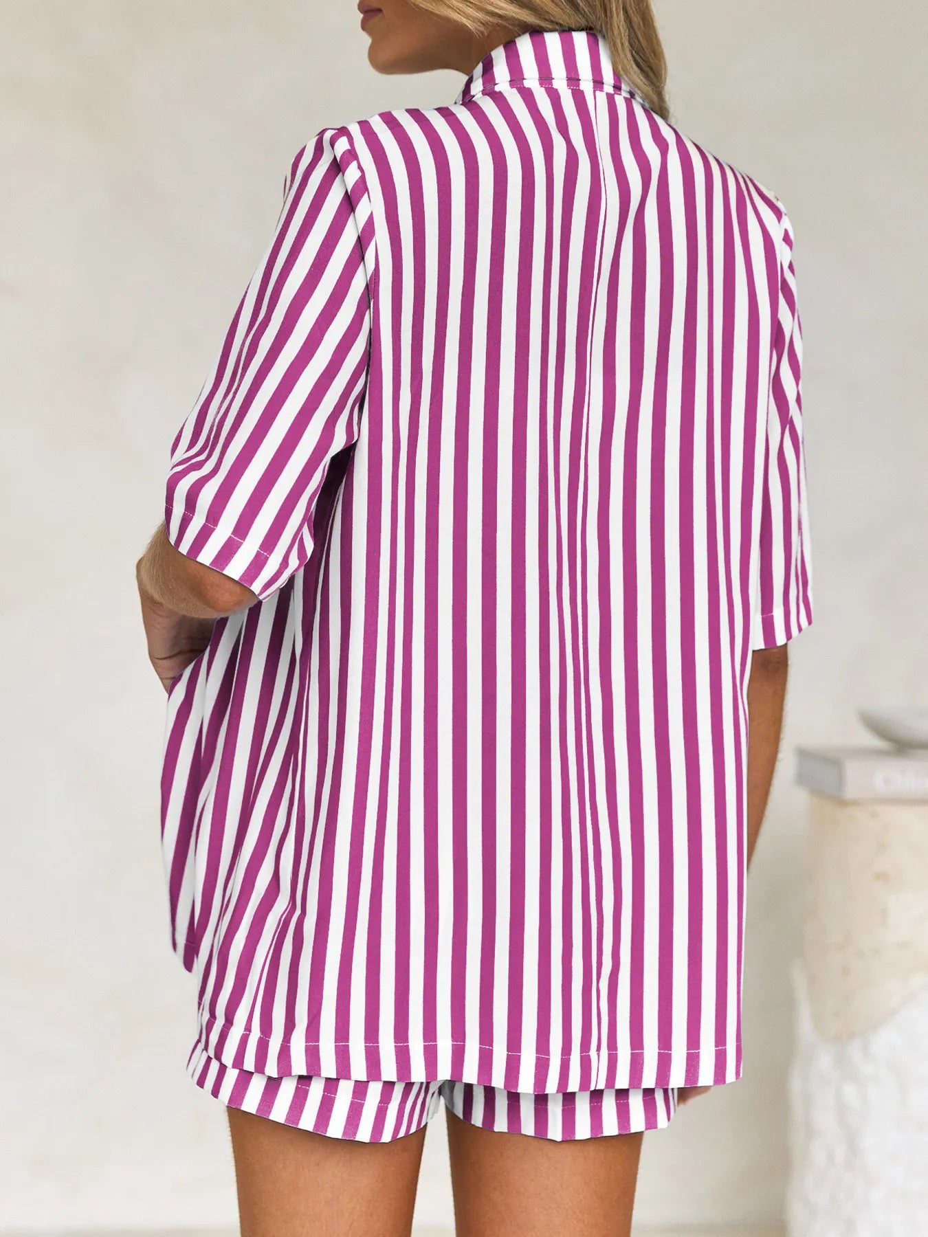 Front view of black and white striped button-up shirt with matching shorts – Voguelle