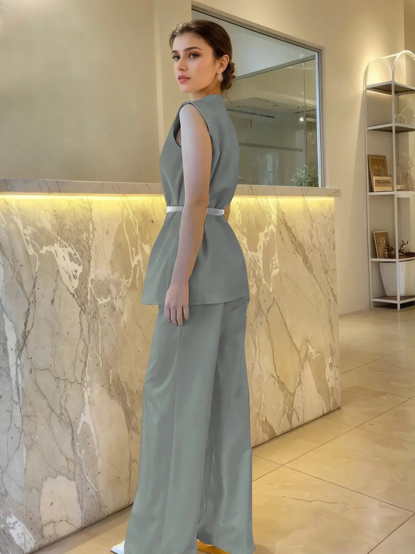 Side view of chic two-piece summer outfit in sage green – Voguelle