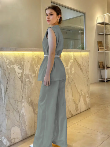 Side view of chic two-piece summer outfit in sage green – Voguelle