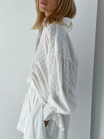 Back detail of textured marigold shirt with relaxed silhouette – Voguelle