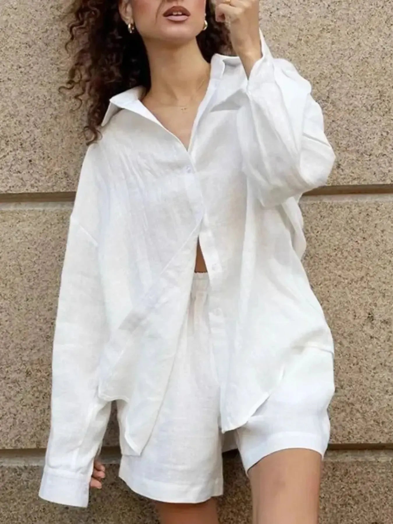 Outfit detail showing waistband and pocket of pink shorts – Voguelle