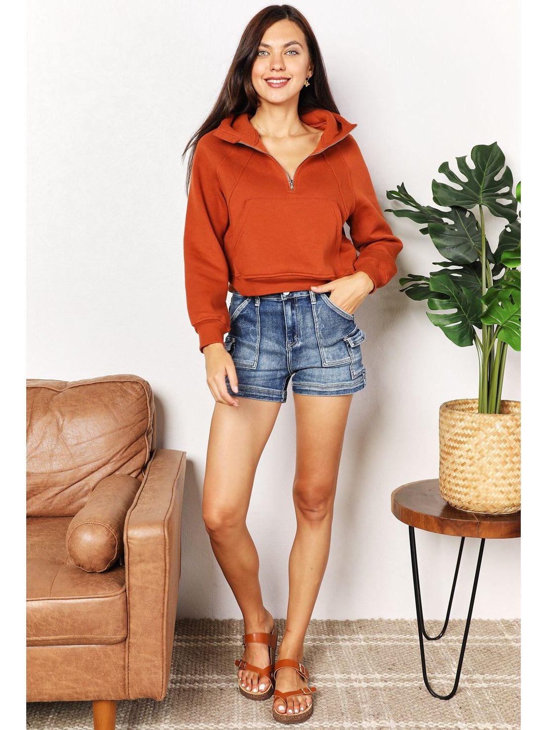 Side angle of rust cropped half-zip hoodie with kangaroo pocket – Voguelle