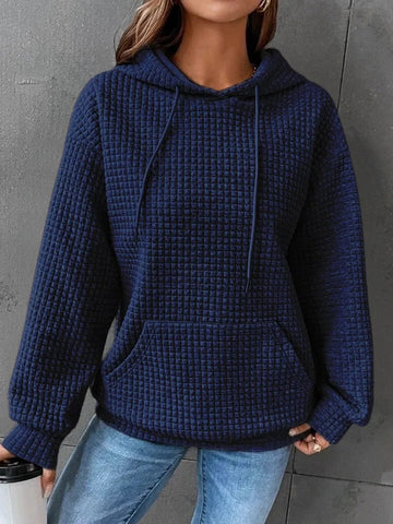 Model layering beige textured hoodie outfit – Voguelle