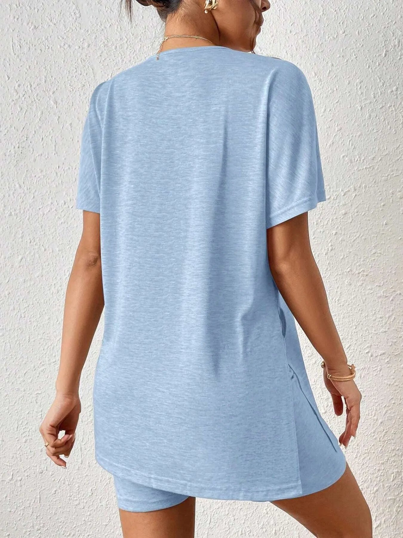 Hemline detail of pink oversized tunic top with slit – Voguelle