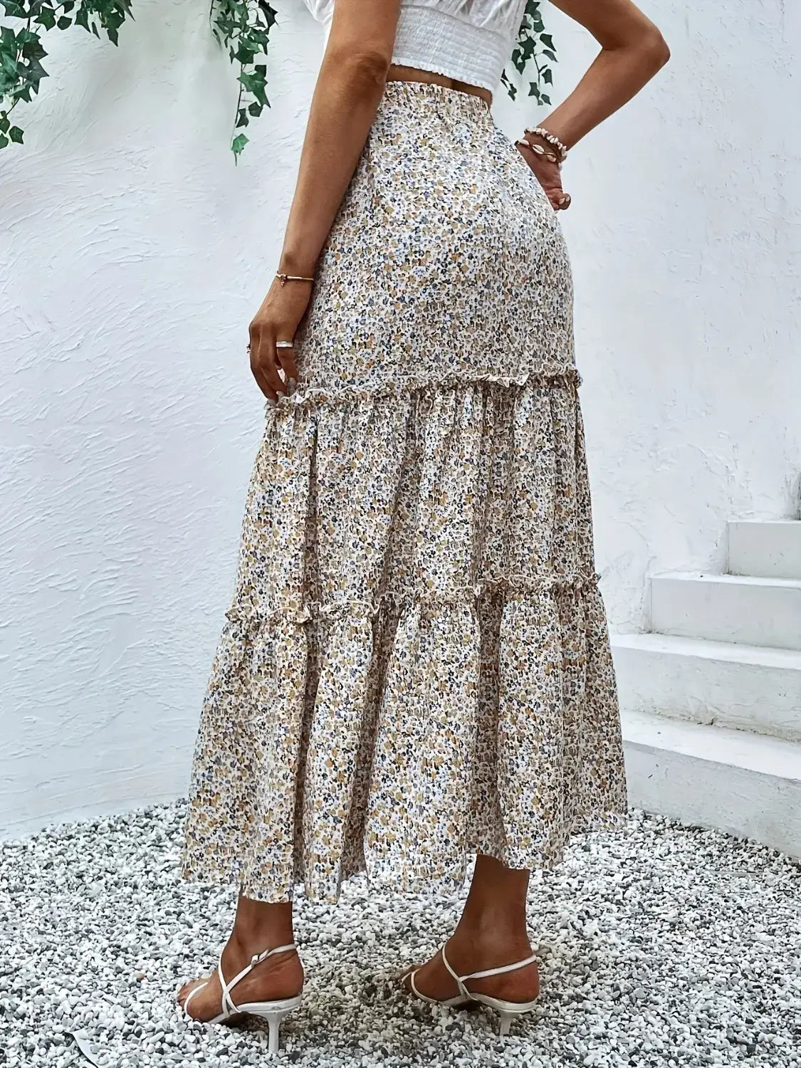 Side view of beige floral tier ruffle maxi skirt – Voguelle