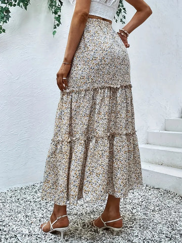 Side view of beige floral tier ruffle maxi skirt – Voguelle