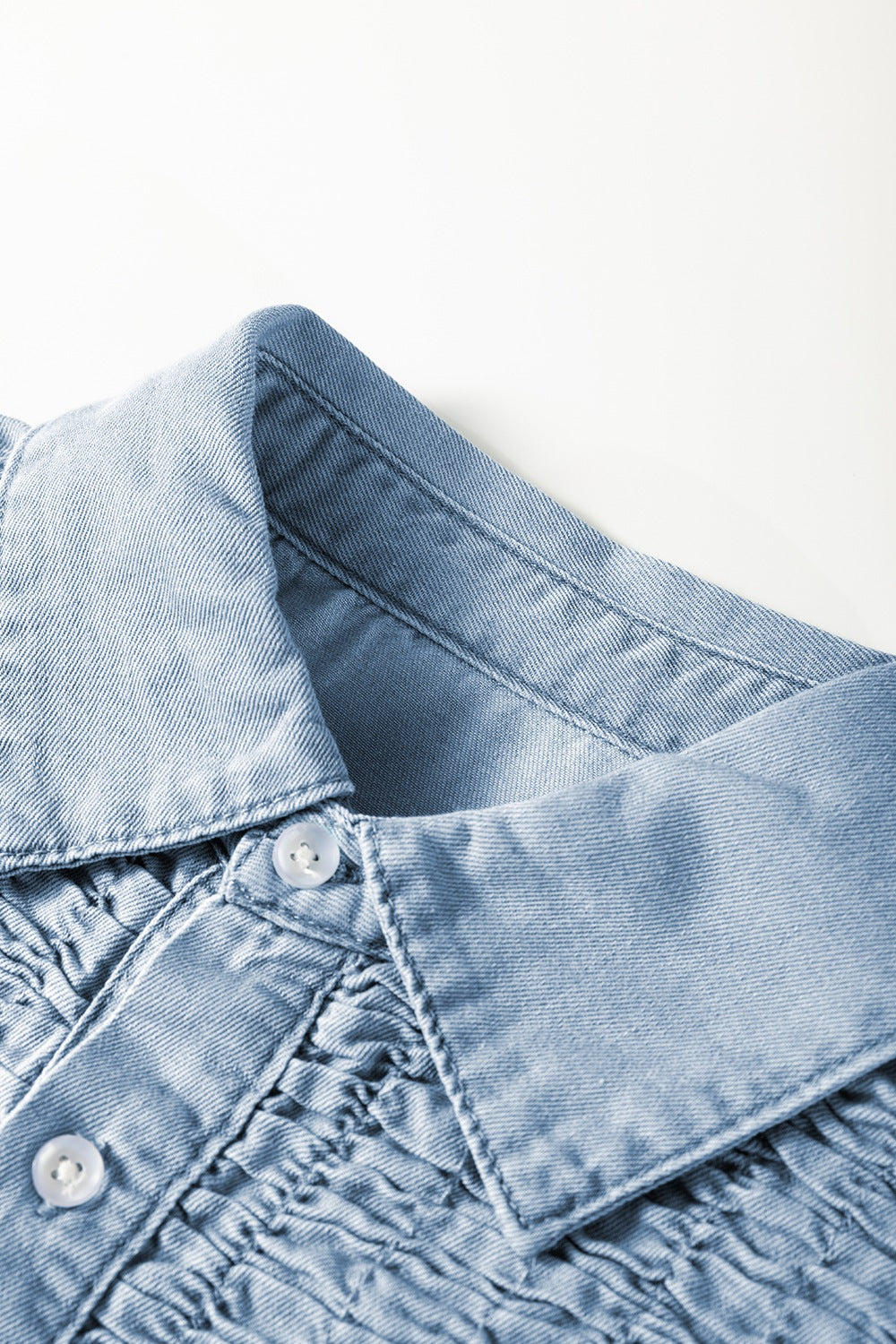 Cap sleeve detail on smocked denim dress in light blue – Voguelle