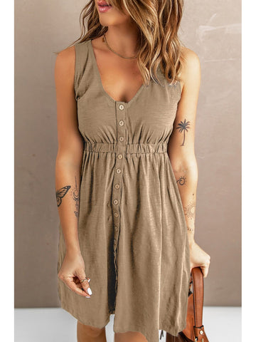 Outdoor lifestyle shot in sleeveless black button down mini dress – Voguelle