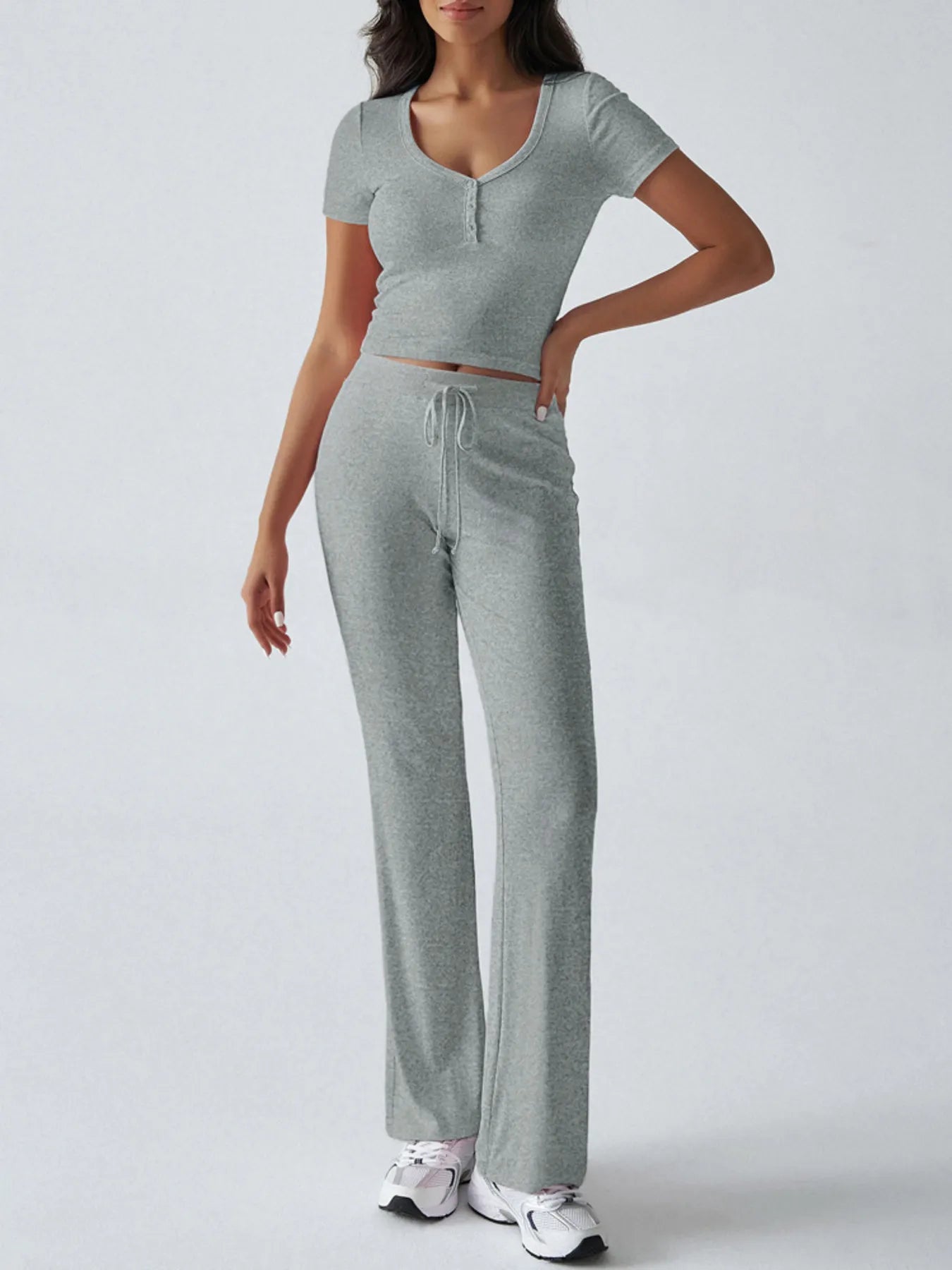 Pink ribbed crop top and matching pants styled with sneakers – Voguelle