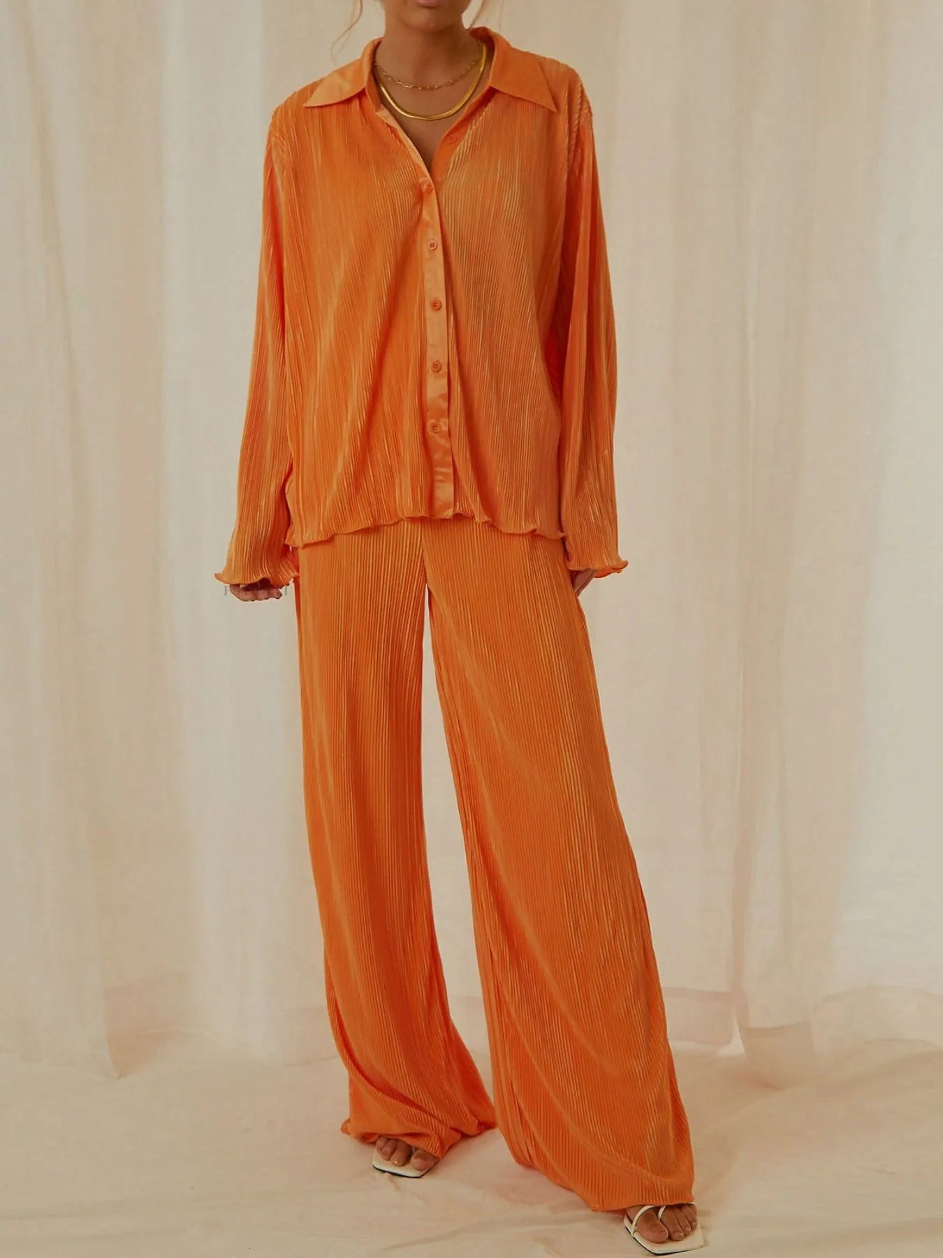 Side angle of orange long sleeve shirt and pants outfit – Voguelle