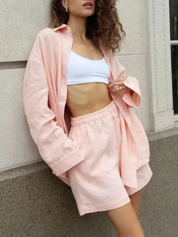 Model walking in lightweight pink summer co-ord set – Voguelle