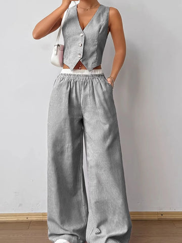 Close-up front detail striped vest and pants outfit – Voguelle