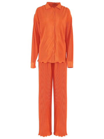 Model wearing orange button-up shirt with matching wide-leg pants – Voguelle