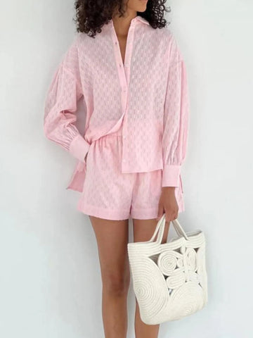 White textured two-piece set styled with minimal accessories – Voguelle