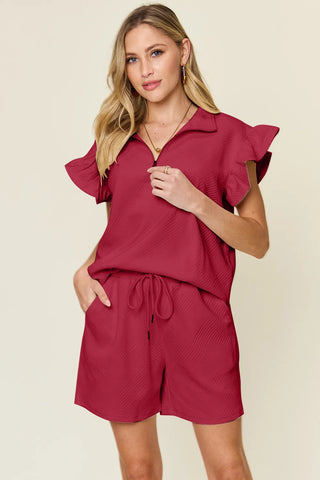 Cream flounce sleeve top tucked into drawstring shorts – Voguelle