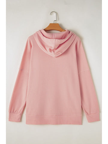 V-neck hooded waffle-knit pullover in gray on model – Voguelle