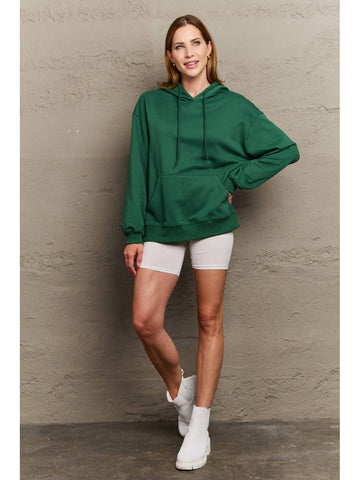 Close-up of camel dropped shoulder hoodie neckline – Voguelle
