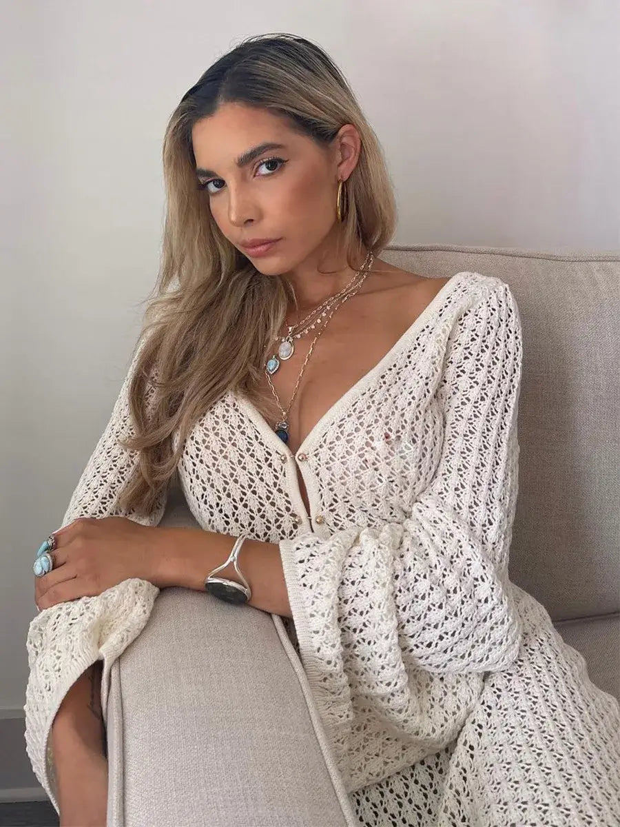Hollow-out knit dress sleeve close-up – Voguelle