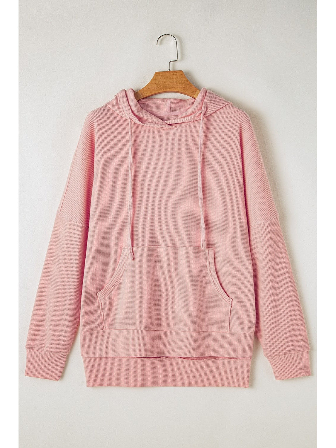 Front pocket detail of gray waffle-knit hoodie – Voguelle