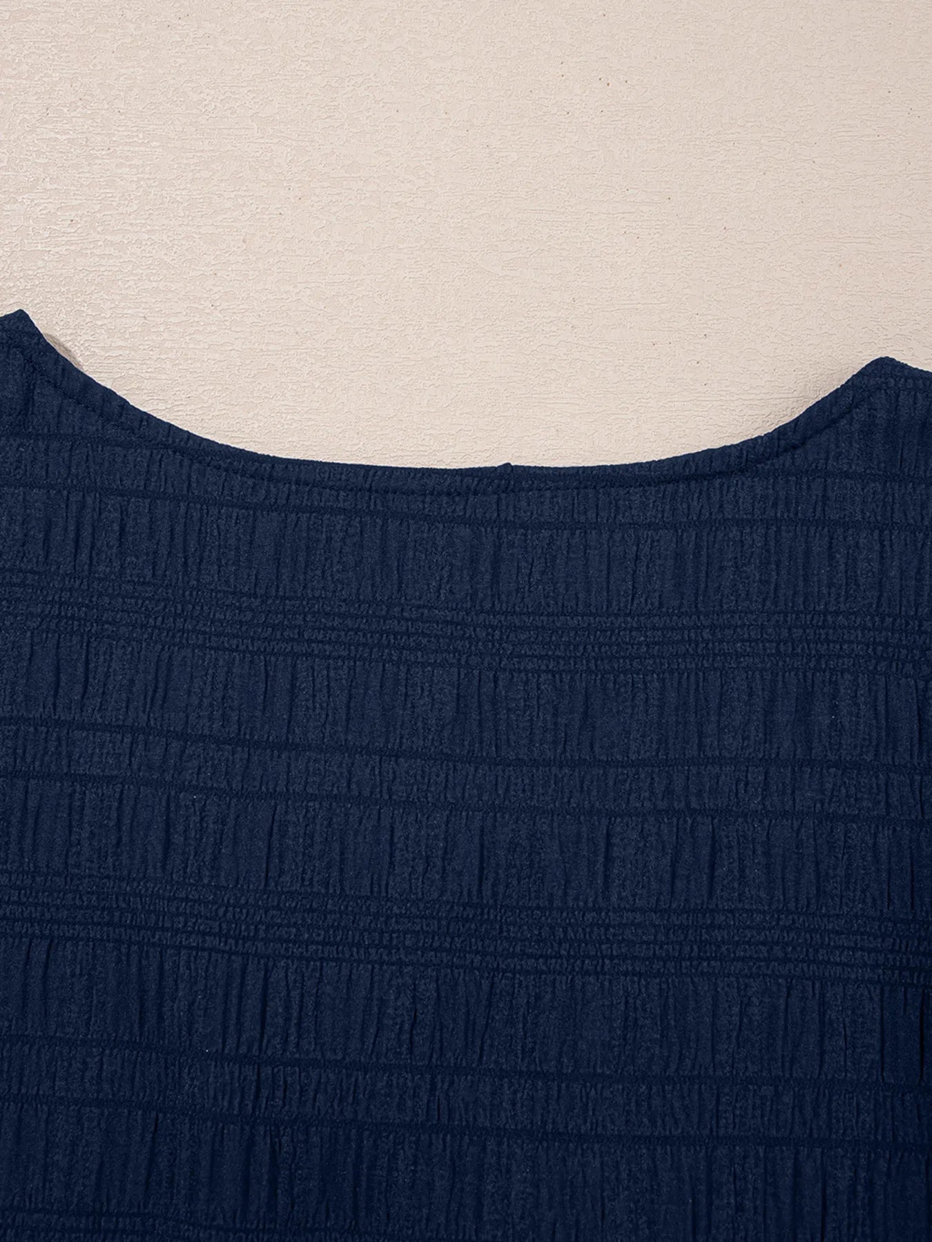 Lifestyle shot of navy two-piece summer outfit styled with accessories – Voguelle