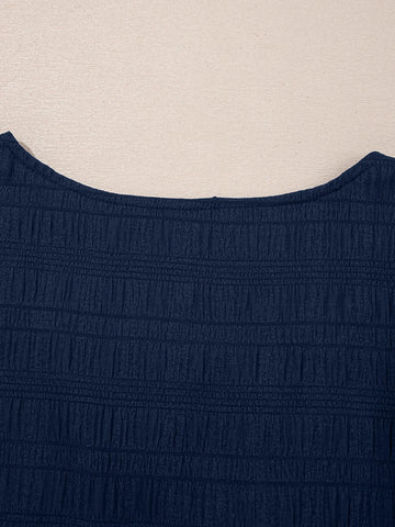 Lifestyle shot of navy two-piece summer outfit styled with accessories – Voguelle