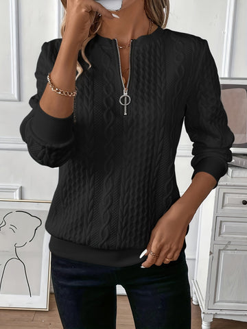 Angled view of half zip textured sweatshirt – Voguelle