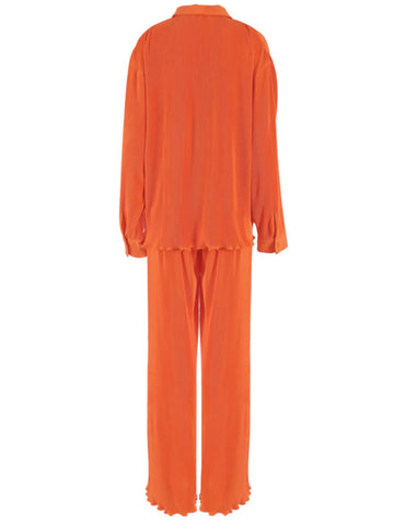Front view of button-up long sleeve orange top and pants set – Voguelle