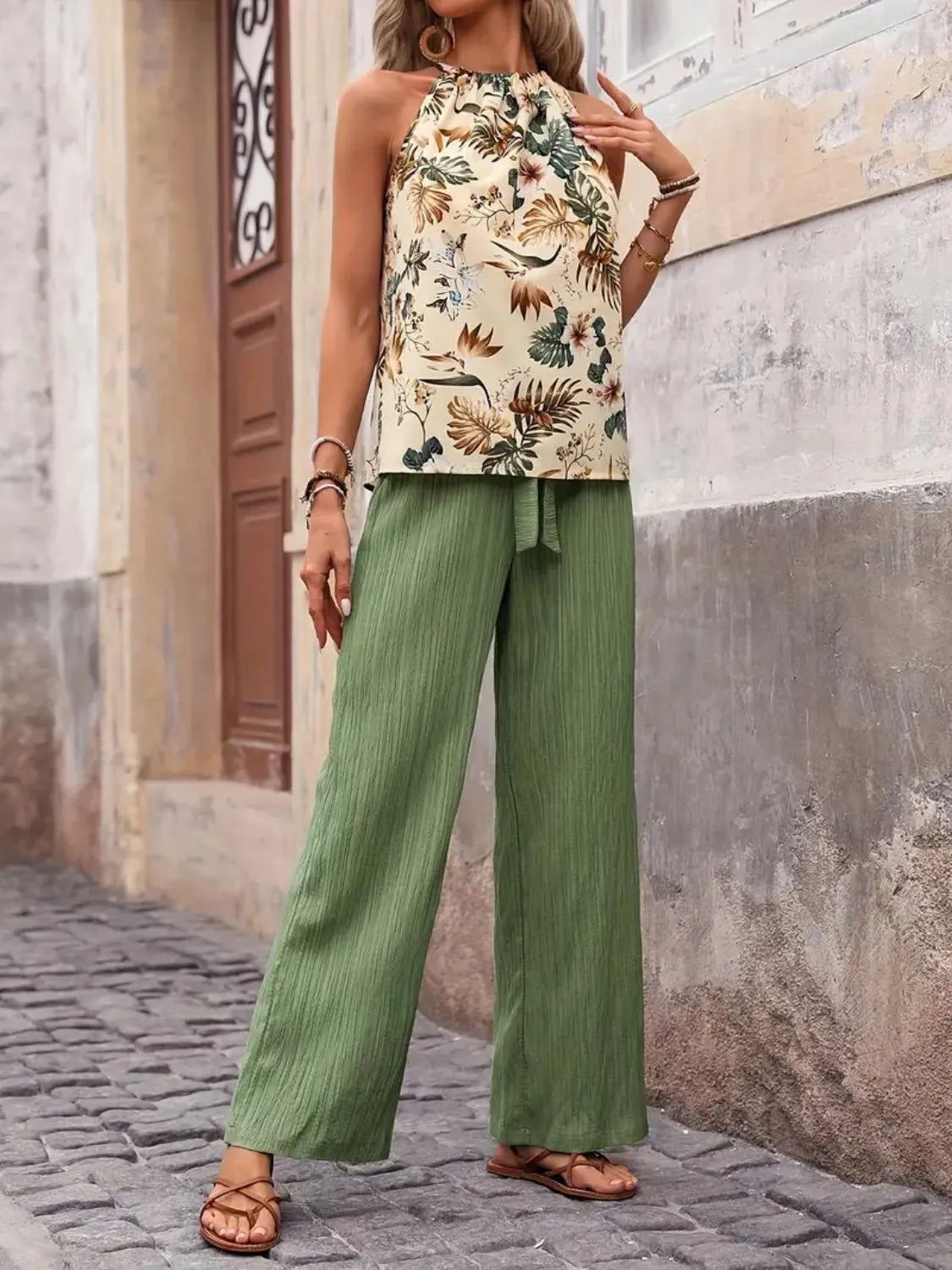 Side pose printed blouse with green wide leg trousers – Voguelle