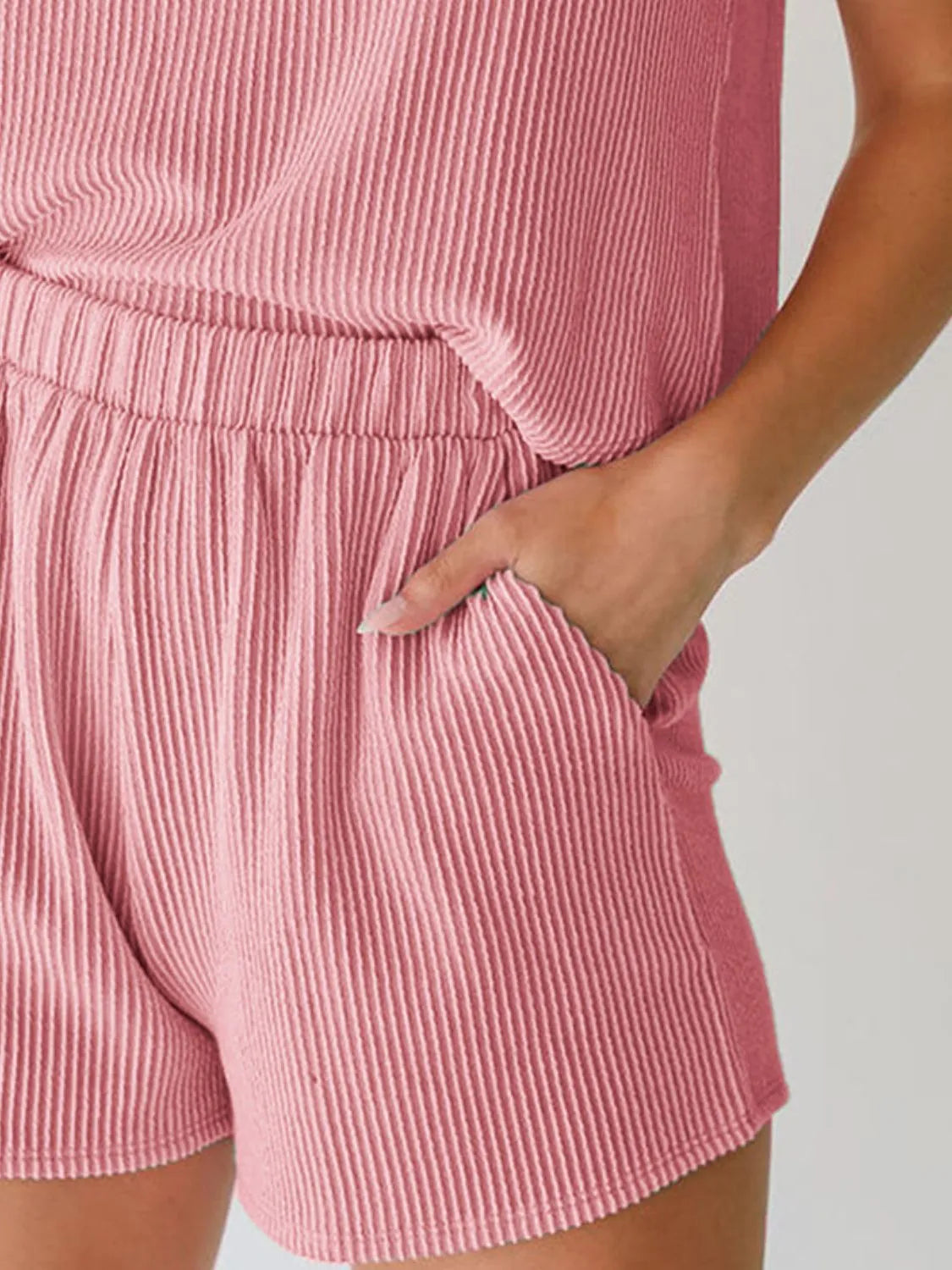 Model wearing chic pink ribbed two-piece lounge set – Voguelle