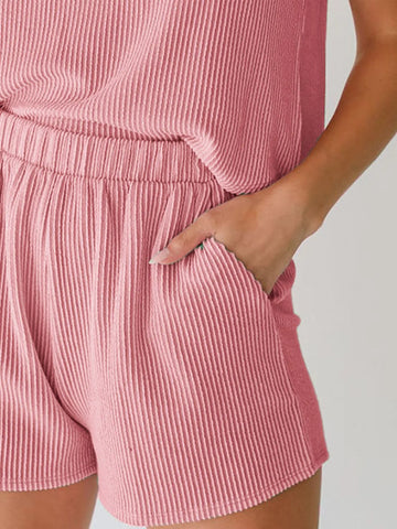 Model wearing chic pink ribbed two-piece lounge set – Voguelle