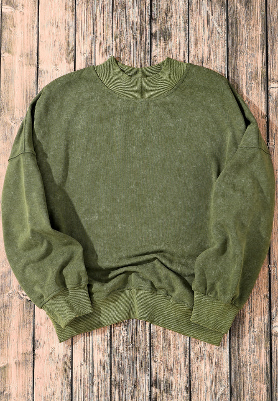 Model in green mock neck dropped shoulder sweatshirt – Voguelle