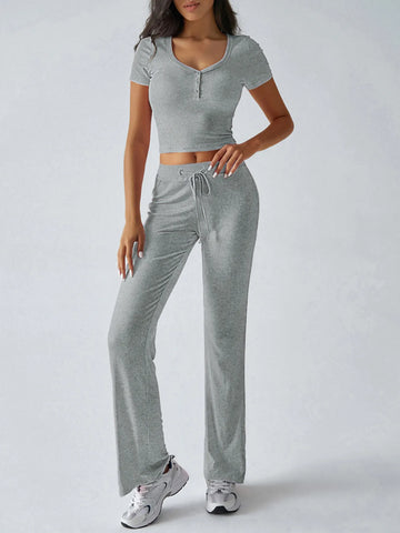 Two-piece pink ribbed crop top and pants set for women – Voguelle
