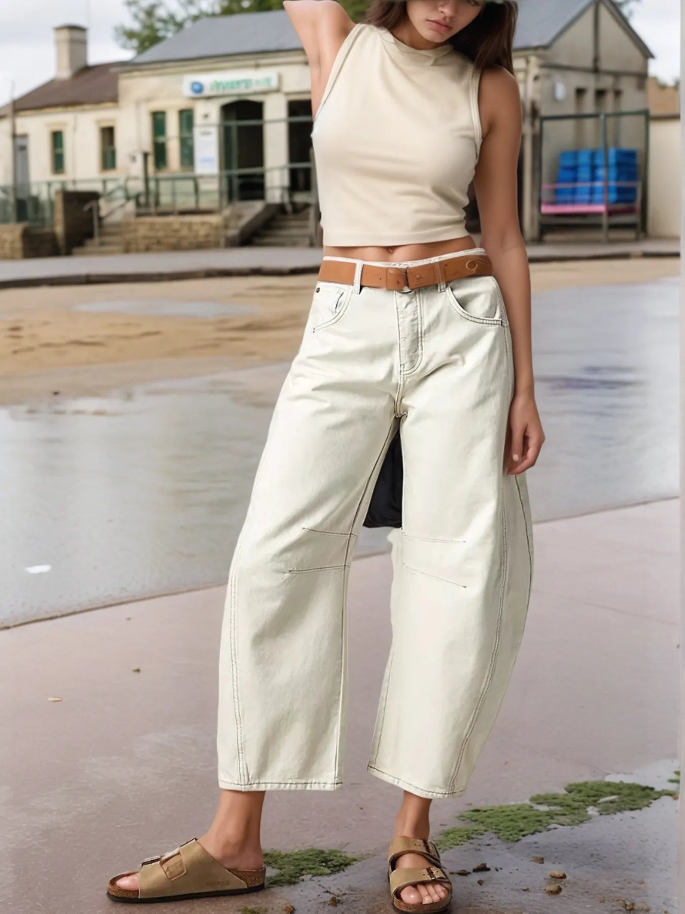 Front view of off-white wide leg jeans styled with top – Voguelle