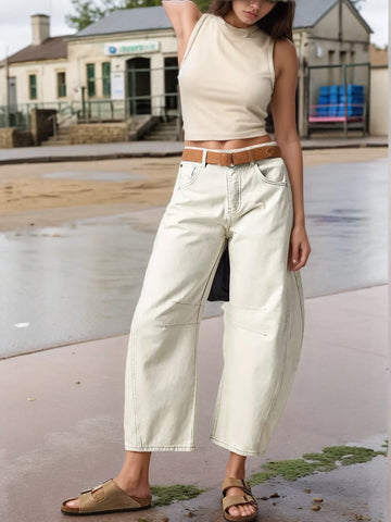 Front view of off-white wide leg jeans styled with top – Voguelle