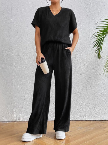 Back view of ribbed black short sleeve lounge set – Voguelle